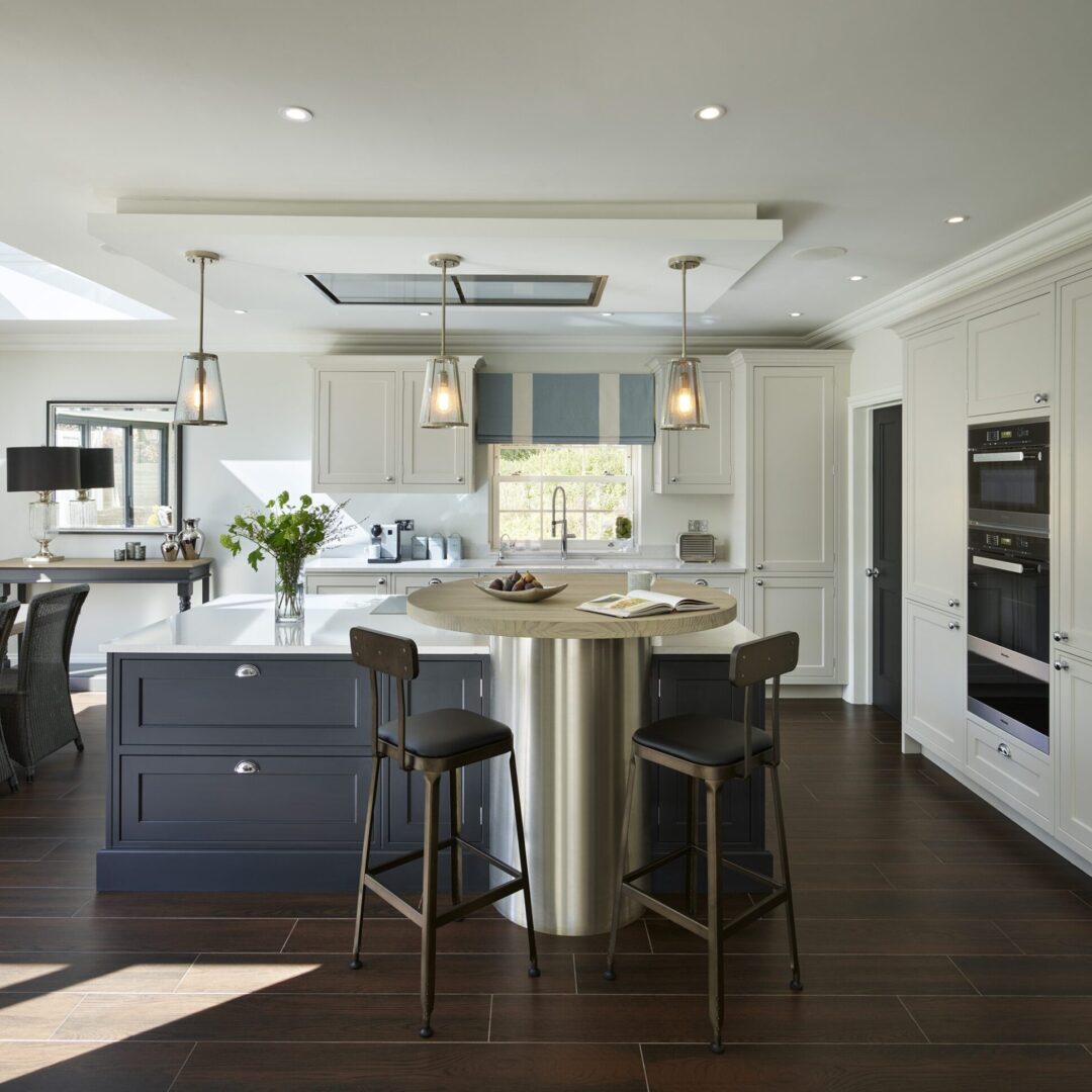 Spacious modern kitchen with white and blue cabinets