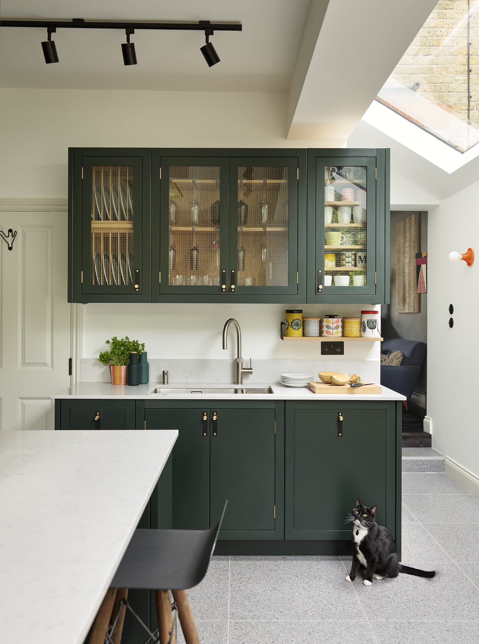 Dark green kitchen cabinets