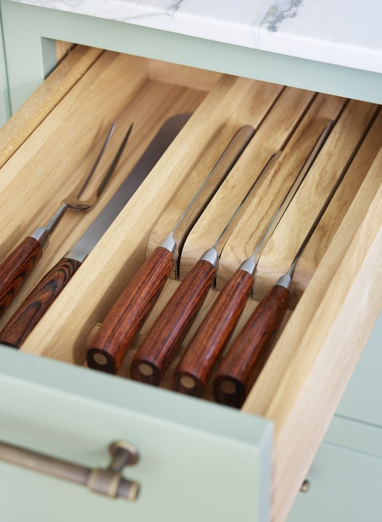 Wooden Drawer And A Fork And Knives